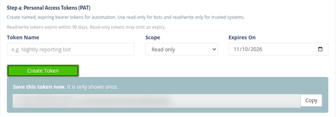 The new token shown once, with a Copy button (value hidden)